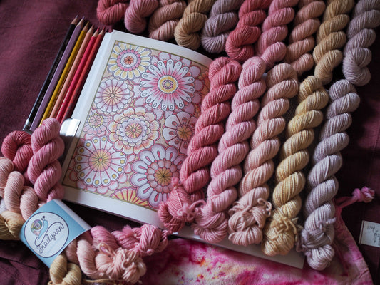 Hand-dyed 5 mini-skein yarn set by Snail Yarn in botanical shades of dusty pink, peach, and mauve, inspired by English roses. High-quality Merino and Peruvian wool for knitting and colorwork.